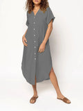 A loose-fitting, mid-length casual dress with button detail on the front, shown in a solid colour.
