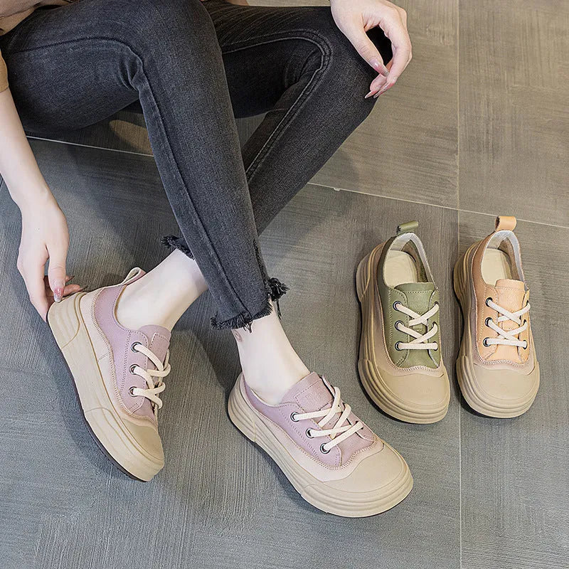 Women's leather platform sneakers in matcha green, showing lace-up front and round toe design.