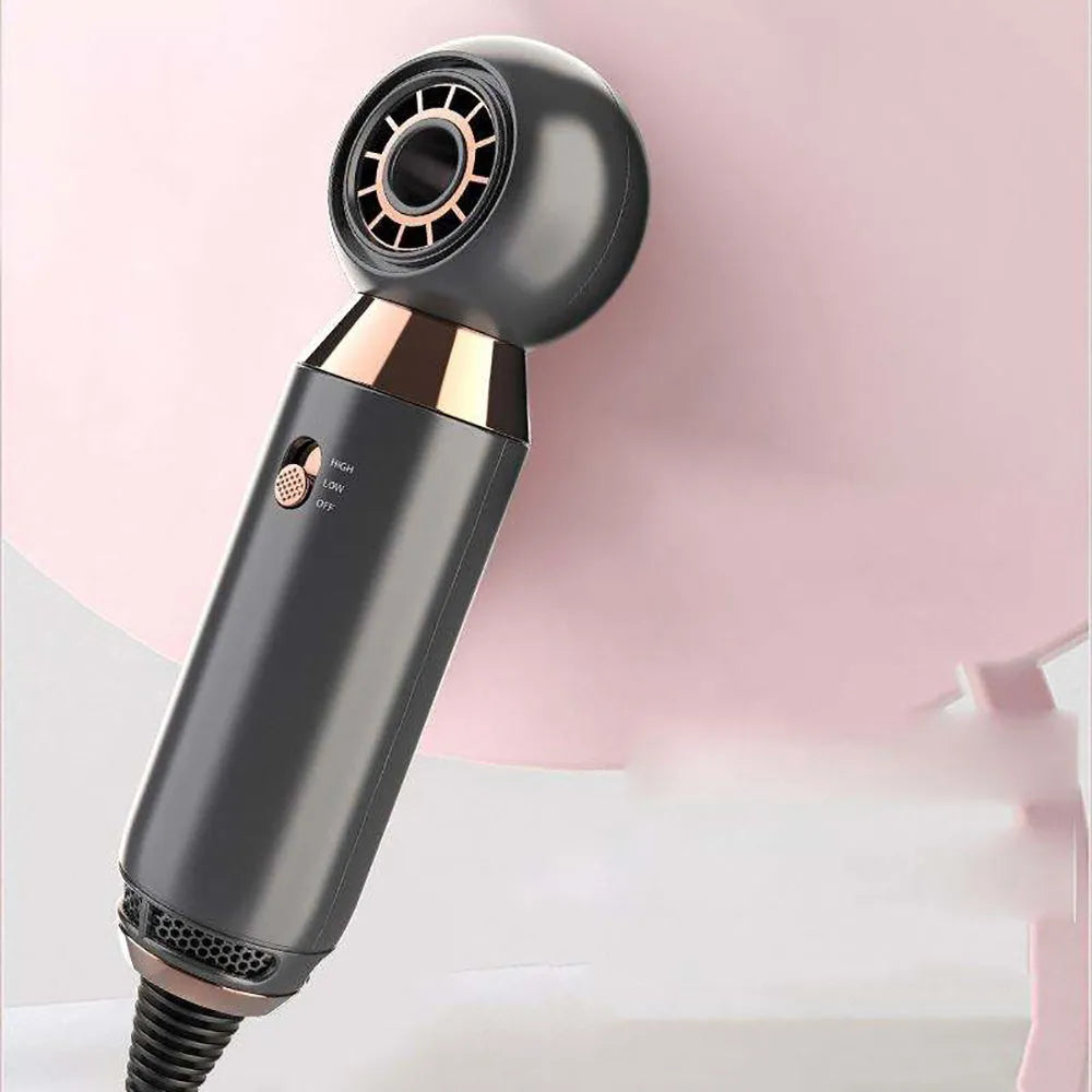 Compact white hair dryer with diffuser accessory, measuring 20cm long with safety plug