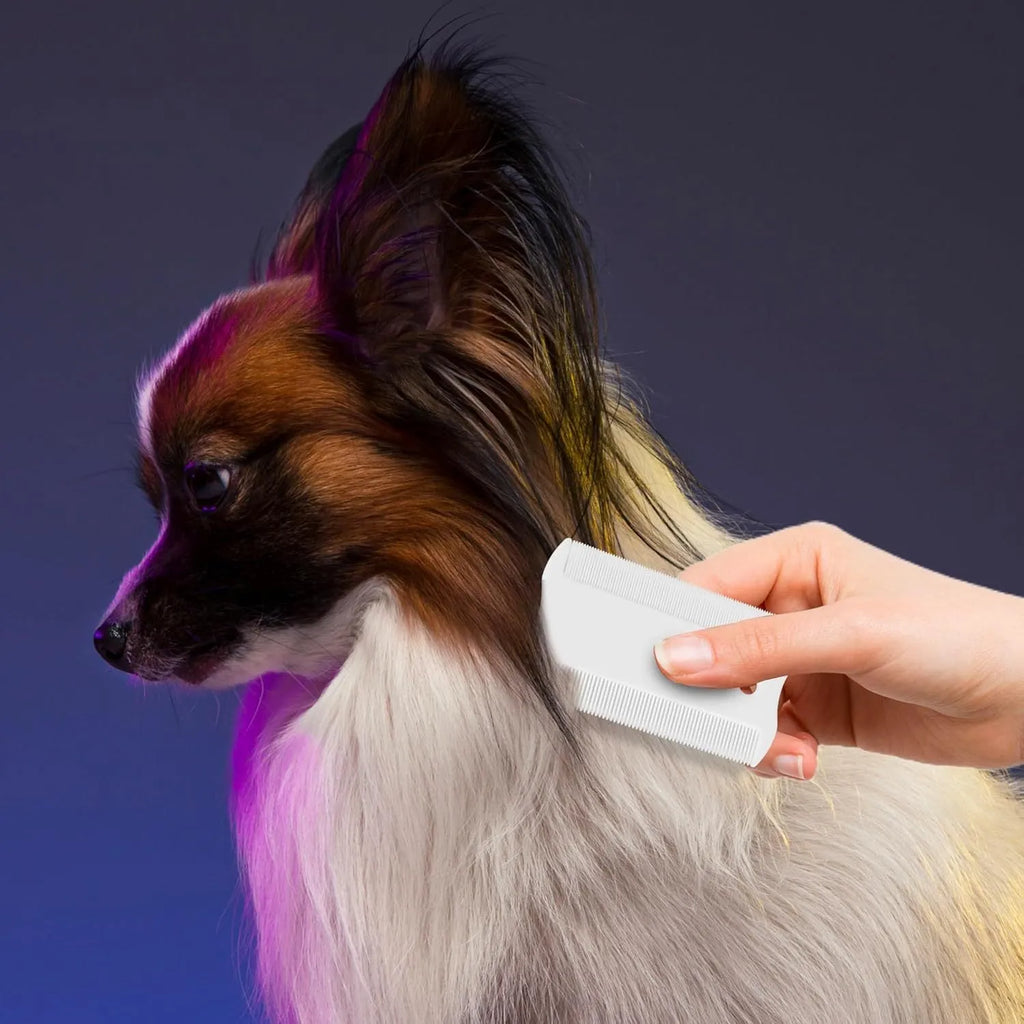 Double sided plastic flea comb for pets with dense teeth and compact grate mouth design.